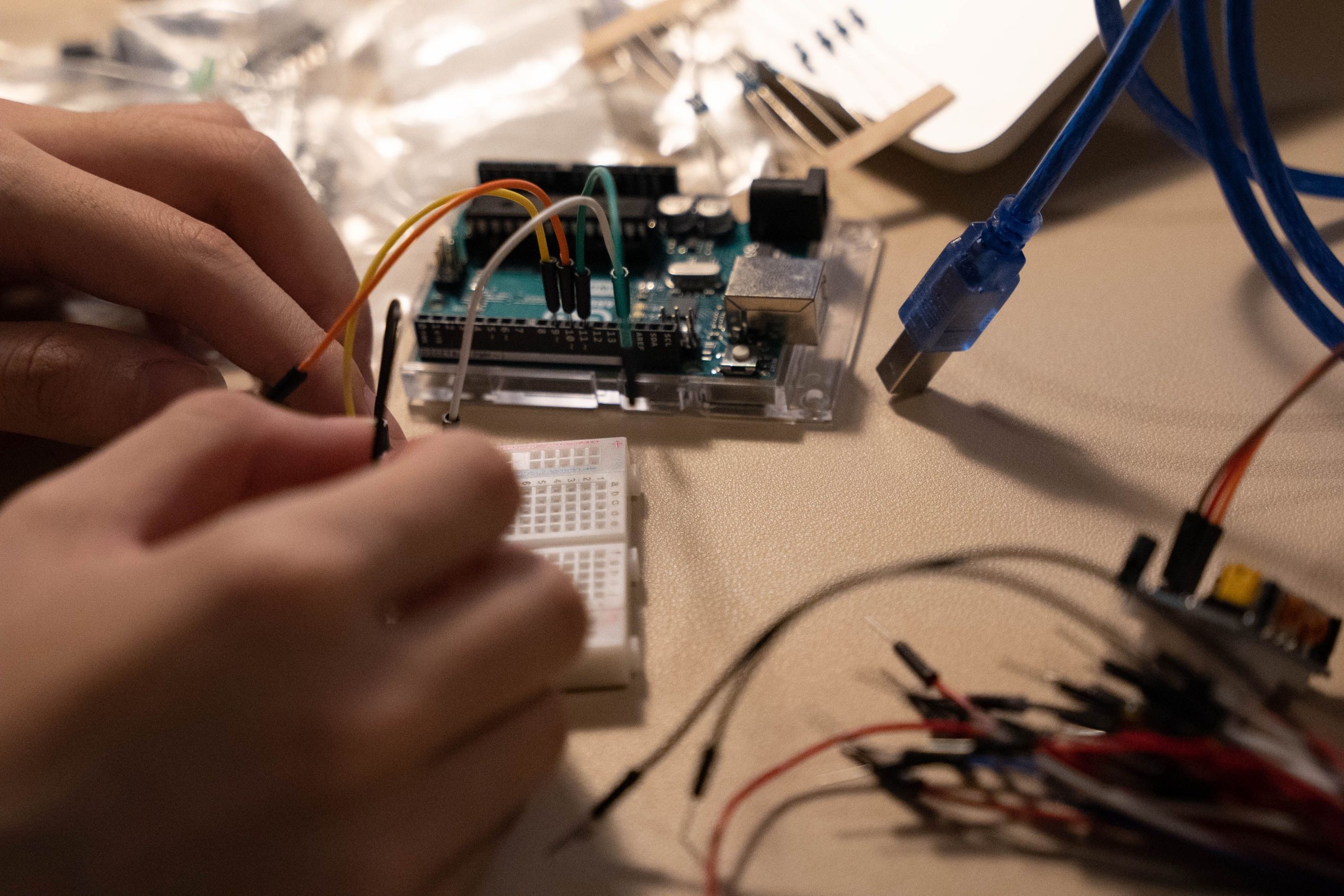 Hands-on electronics work in a STEAM learning workshop